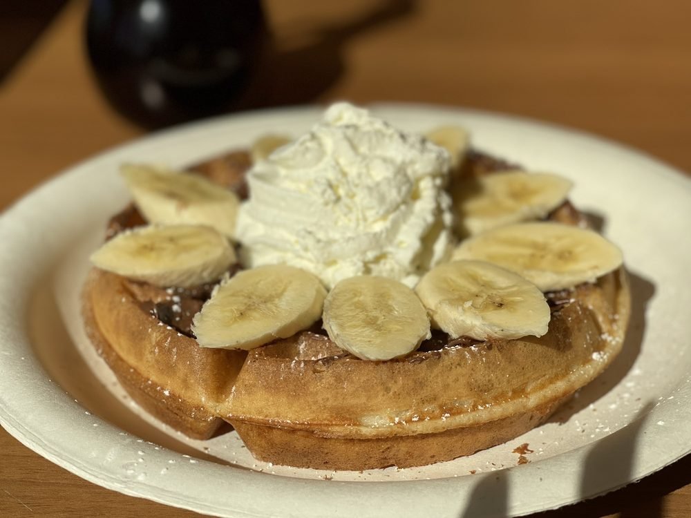 Our original waffle spread with Nutella and topped with banana slices
