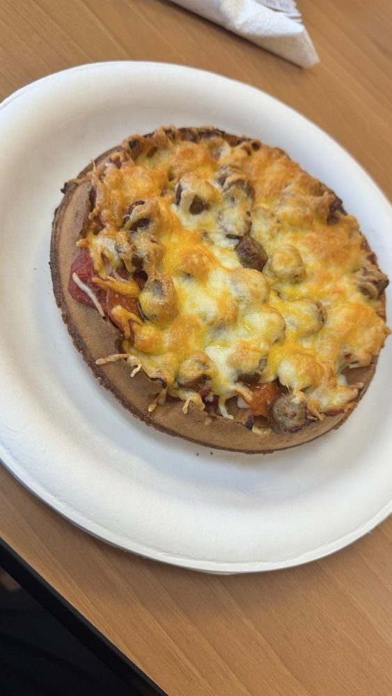 Pepperoni sausage waffle pizza with sliced sausage and cheese
